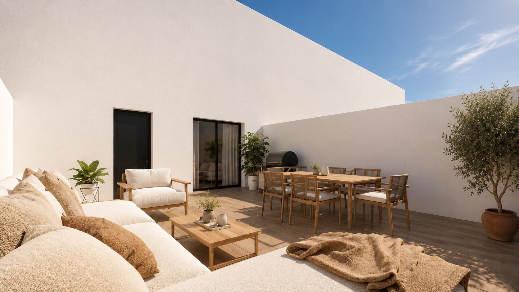 Terraza exterior con zona de estar y comedor en el Edificio CENTRVM